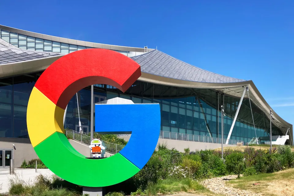 Large colorful letter G in front of Google campus building in Mountain View, California.